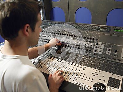 Sound Technician In Recording Studio Stock Photo