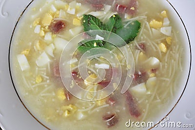 The soup with egg and ham noodles typical Andalusian and Spanish