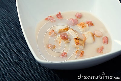 Soup of Jerusalem artichokes and scallops Stock Photo