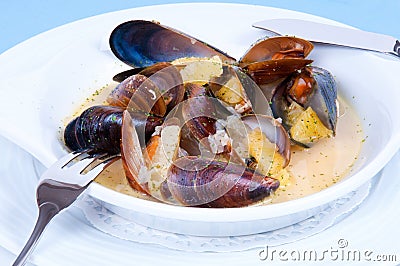 Soup with oysters. Exotic seafood dishes. Stock Photo