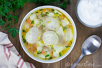 Soup with pelmeni (russian dumplings) Stock Photo