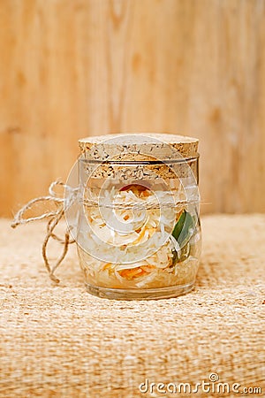 Sour cabbage - sauerkraut - in glass jar Stock Photo