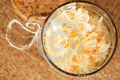 Sour cabbage - sauerkraut - in glass jar Stock Photo