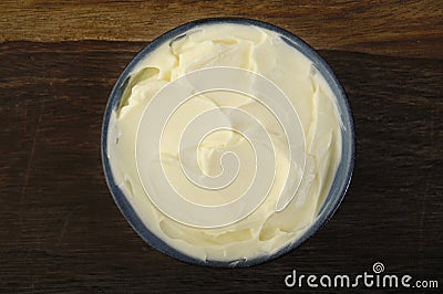 Sour cream cheese in bowl Stock Photo
