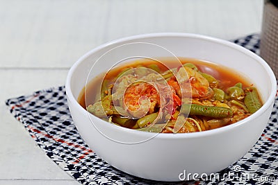 Sour Katuri Flower with shrimp and yardlong bean curry,Kaeng Som Dok khae Stock Photo
