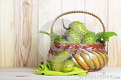 Soursop fruit on wooden table. Stock Photo
