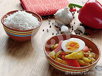South African curry with vegetables, fruit and eggs Stock Photo