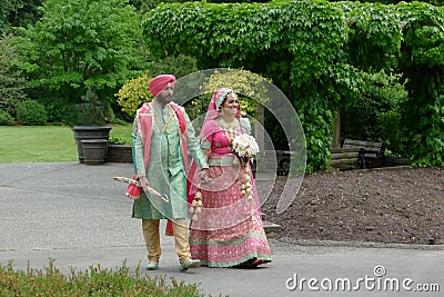 South Asian Couple in Wedding Attire Editorial Stock Photo