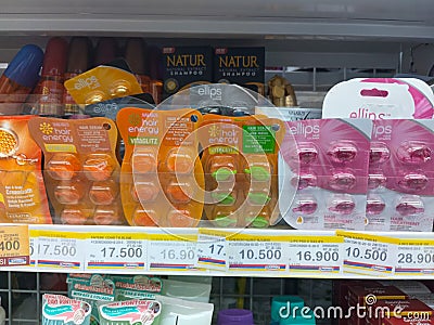 Various vitamins for hair in the minimarket window Editorial Stock Photo