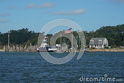 The South Ferry Company boat offers transportation for both passengers and vehicles between Shelter Island and New Haven Editorial Stock Photo