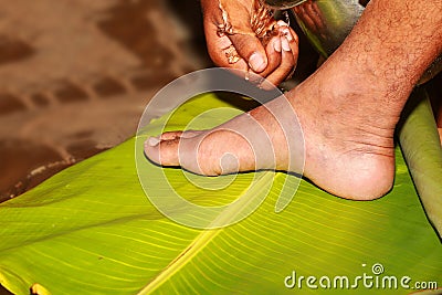 South Indian Hindu Wedding tradition, Groom and Bridal Legs and Hands Ceremonial Stock Photo