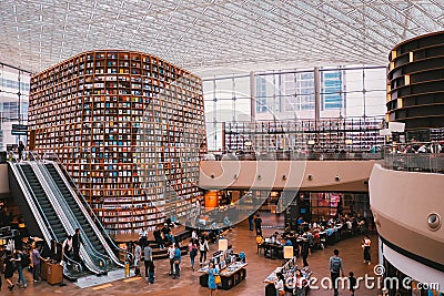 South korea, Seoul Samseong Station Star-Yard Library, People watching books. Editorial Stock Photo