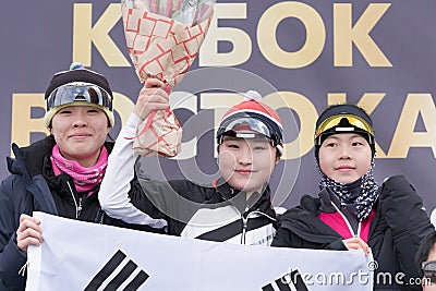 South Korea team of sportswoman biathletes during award ceremony Junior biathlon competitions East of Cup Editorial Stock Photo