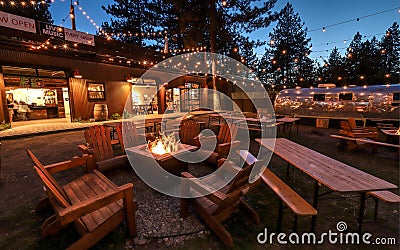 SOUTH LAKE TAHOE, CALIFORNIA, UNITED STATES - Oct 07, 2019: Basecamp Tahoe South Hotel lawn seating Editorial Stock Photo