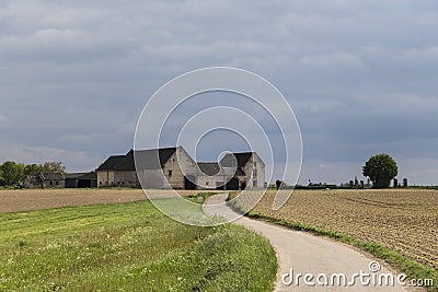 Old Berghof farm in Gulpen, Wijlre, built from mixed building materials that were available locally such as marl. Stock Photo