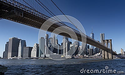 South Manhattan from under Brooklyn Bridge Stock Photo