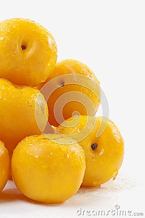Southafrican yellow plums on white background Stock Photo