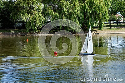 Sailing model yachts on a lake in Southend-on-sea Essex on August 4, 2013 Editorial Stock Photo