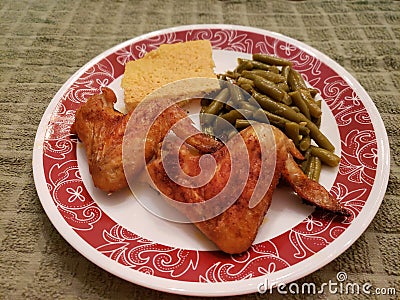 Baked Chicken Southern Healthy Meal on Green Background Stock Photo