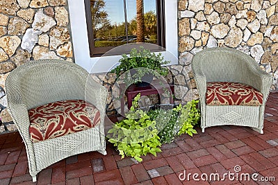 southern style cobblestone porch chairs Stock Photo