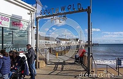 Southwold`s iconic pier and pier sign in Southwold, Suffolk, UK Editorial Stock Photo