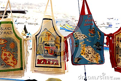 Souvenir Aprons, Marsaxlokk, Malta. Stock Photo