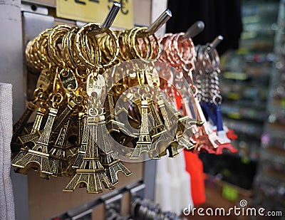 Souvenir Eiffel tower, a lot of hanging for sale. silver color in the French tricolor. Stock Photo
