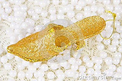 Souvenir fancy shoe and beads of pearls Stock Photo