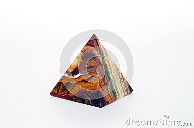 Souvenir from onyx pyramid on white background Stock Photo