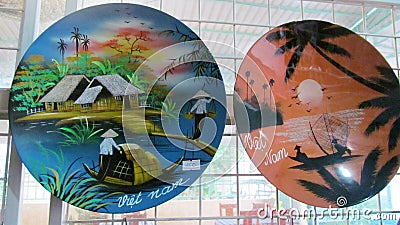 Souvenir painted plates from Vietnam Editorial Stock Photo