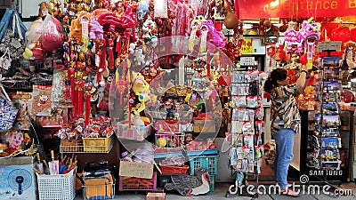 Souvenir shop selling different gift for tourists in Chinatown Singapore Editorial Stock Photo