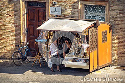 Souvenir stall banquet italy old ladies senior Editorial Stock Photo