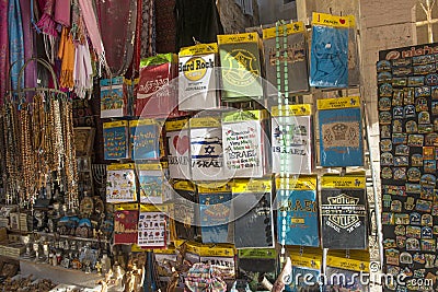 Souvenir T-shirts in the shops The old streets and houses of the ancient city of Jerusalem Editorial Stock Photo