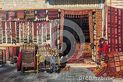 Souvenirs for sale at the Toqi Sarrofon Bazaar in the center of Bukhara, Uzbekist Editorial Stock Photo