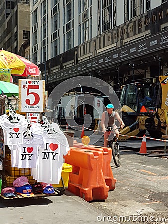 Souvenirs sold on the street in New York city.I love NY Editorial Stock Photo