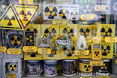 Souvenirs with a symbol of radiation danger in souvenir shop on enter to Chornobyl exclusion zone. Ukraine, 25-12-2019 Editorial Stock Photo