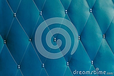 Soviet classic blue dermantine front door with a banner of fishing line and nails - full frame background and texture Stock Photo