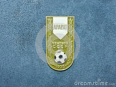 Soviet metal badge with the inscription in Russian `Ararat Erevan the champion of the USSR and the year of victory` Editorial Stock Photo
