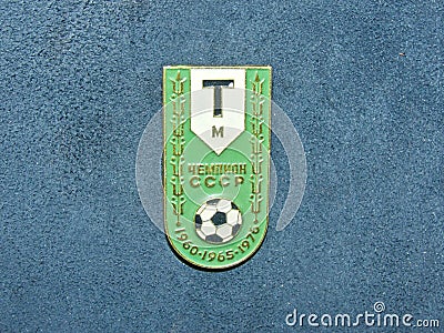 Soviet metal badge with the inscription `Torpedo Moscow champion of the USSR and the year of victory` Editorial Stock Photo