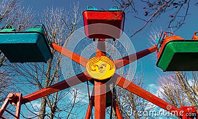 Soviet mini ferris wheel in an amusement park Stock Photo