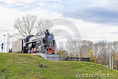 Soviet old, vintage train, steam locomotive with a red star Editorial Stock Photo
