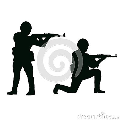 2 Soviet soldiers with 1980`s style uniforms and weapons. Silhouette Stock Photo