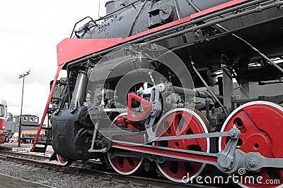 Soviet steam locomotive. View along, closeup. Chassis Editorial Stock Photo