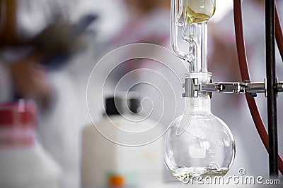 Soxhlet extractor for extraction essential oils.Transporting liquid from soxhlet extractor to distillation apparatus.Demonstration Stock Photo