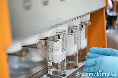 Soxhlet Extractor.Percolator-boiler and reflux,distillation flask on heating element. Stock Photo
