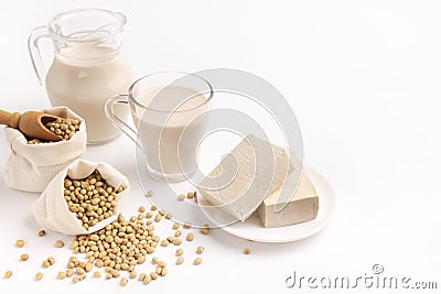 Soy and derivatives. Soy milk, white blocks cheese Stock Photo