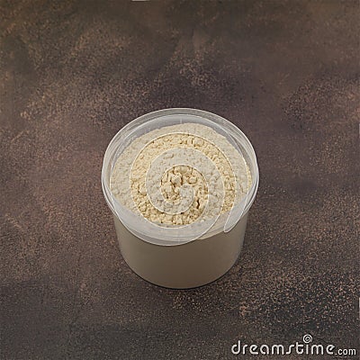 Soy Protein isolate in transparent plastic box. Pure powder Stock Photo