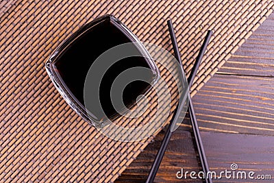 Soy sauce in a gravy boat. Flat lay. Stock Photo