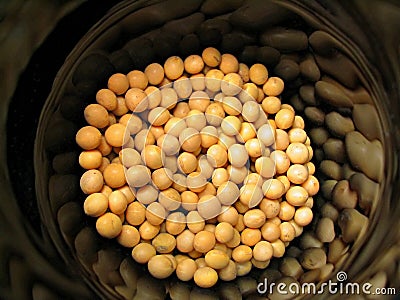 Soybeans in black container Stock Photo