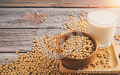 Soybeans in brown wooden bowl with Soy milk Editorial Stock Photo